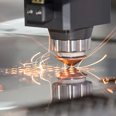 Precision laser cutting on a metal surface