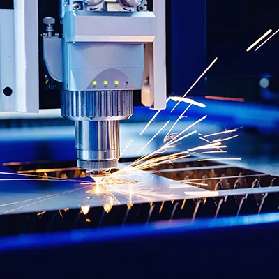 Metal processing with a laser cutting head